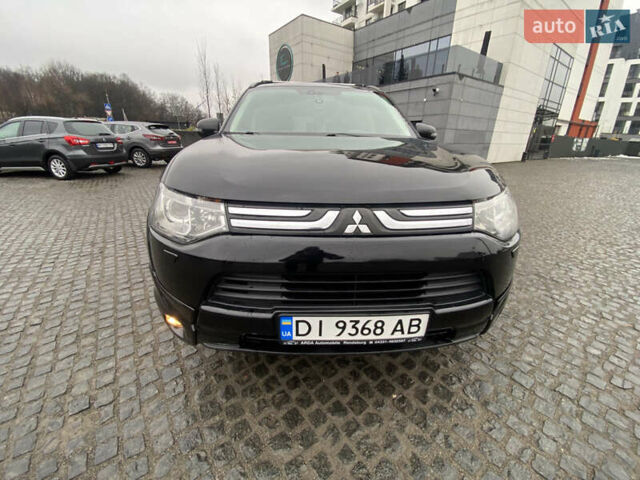 Черный Мицубиси Аутлендер, объемом двигателя 2.27 л и пробегом 280 тыс. км за 11808 $, фото 1 на Automoto.ua