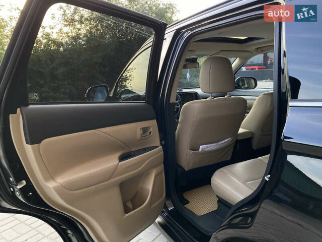 Черный Мицубиси Аутлендер, объемом двигателя 2.27 л и пробегом 241 тыс. км за 14400 $, фото 44 на Automoto.ua