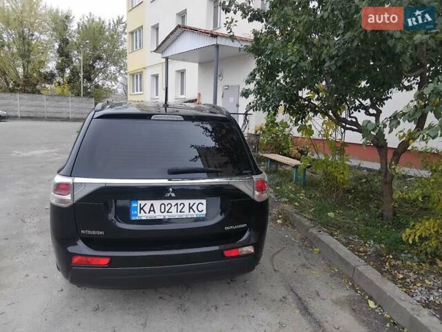 Чорний Міцубісі Аутлендер, об'ємом двигуна 2.36 л та пробігом 170 тис. км за 13500 $, фото 9 на Automoto.ua