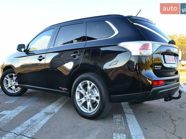 Чорний Міцубісі Аутлендер, об'ємом двигуна 2.2 л та пробігом 237 тис. км за 12550 $, фото 27 на Automoto.ua