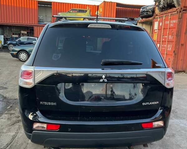 Черный Мицубиси Аутлендер, объемом двигателя 2.36 л и пробегом 226 тыс. км за 12499 $, фото 12 на Automoto.ua