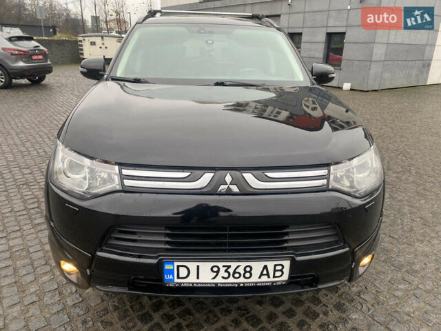 Черный Мицубиси Аутлендер, объемом двигателя 2.27 л и пробегом 280 тыс. км за 11808 $, фото 18 на Automoto.ua