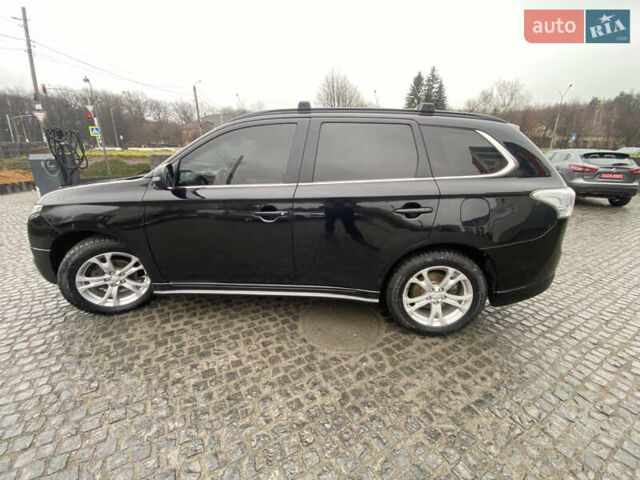 Черный Мицубиси Аутлендер, объемом двигателя 2.27 л и пробегом 280 тыс. км за 11808 $, фото 20 на Automoto.ua