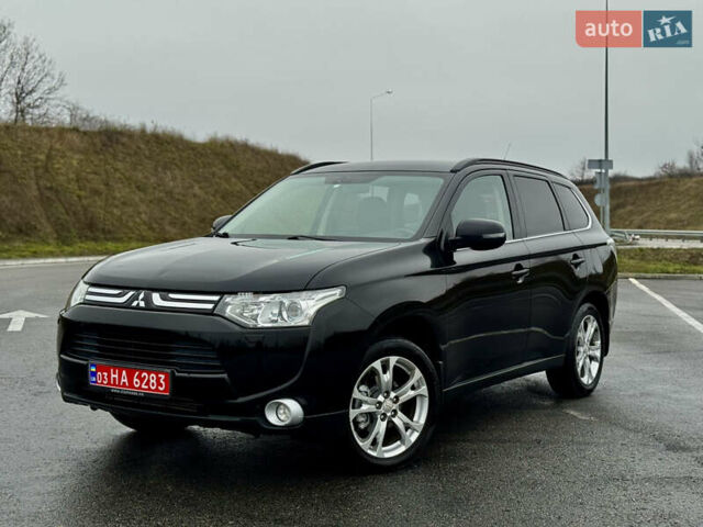 Черный Мицубиси Аутлендер, объемом двигателя 2.2 л и пробегом 250 тыс. км за 12750 $, фото 3 на Automoto.ua