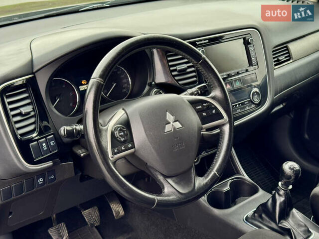 Черный Мицубиси Аутлендер, объемом двигателя 2.2 л и пробегом 250 тыс. км за 12750 $, фото 17 на Automoto.ua