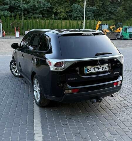 Мицубиси Аутлендер 2013 в Львове на Automoto.ua Черный Мицубиси Аутлендер, объемом двигателя 2.4 л и пробегом 236 тыс. км за 13000 $, фото 5 на Automoto.ua