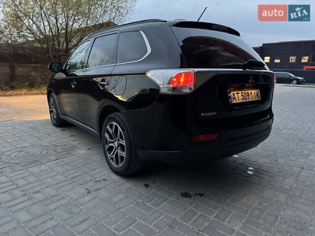 Черный Мицубиси Аутлендер, объемом двигателя 2.27 л и пробегом 241 тыс. км за 14400 $, фото 19 на Automoto.ua
