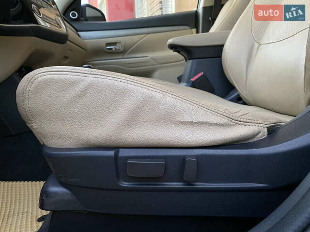 Черный Мицубиси Аутлендер, объемом двигателя 2.27 л и пробегом 241 тыс. км за 14400 $, фото 56 на Automoto.ua