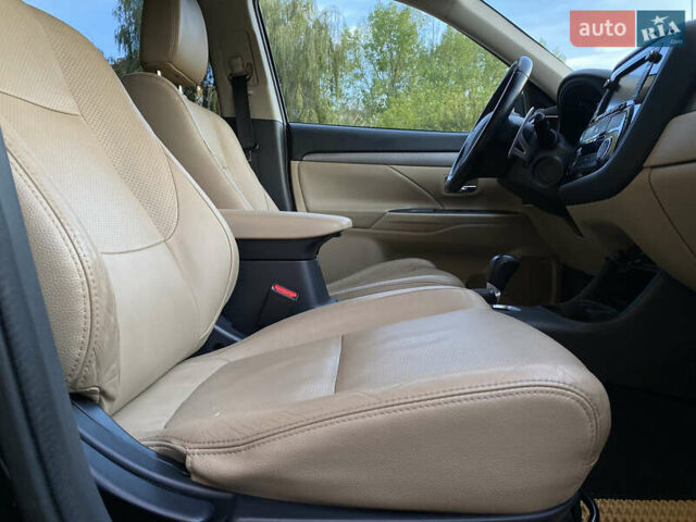 Черный Мицубиси Аутлендер, объемом двигателя 2.27 л и пробегом 241 тыс. км за 14400 $, фото 28 на Automoto.ua