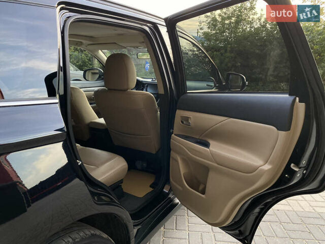 Черный Мицубиси Аутлендер, объемом двигателя 2.27 л и пробегом 241 тыс. км за 14400 $, фото 31 на Automoto.ua