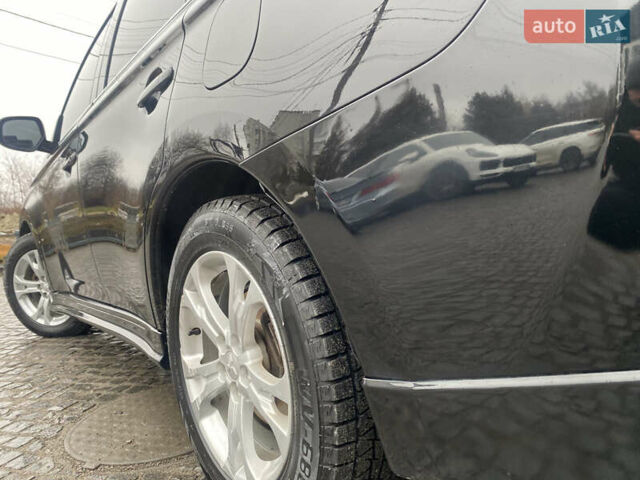 Черный Мицубиси Аутлендер, объемом двигателя 2.27 л и пробегом 280 тыс. км за 11808 $, фото 5 на Automoto.ua