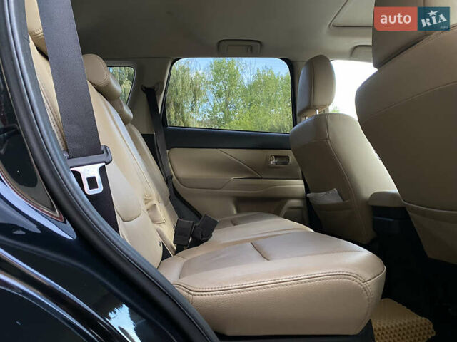 Черный Мицубиси Аутлендер, объемом двигателя 2.27 л и пробегом 241 тыс. км за 14400 $, фото 33 на Automoto.ua