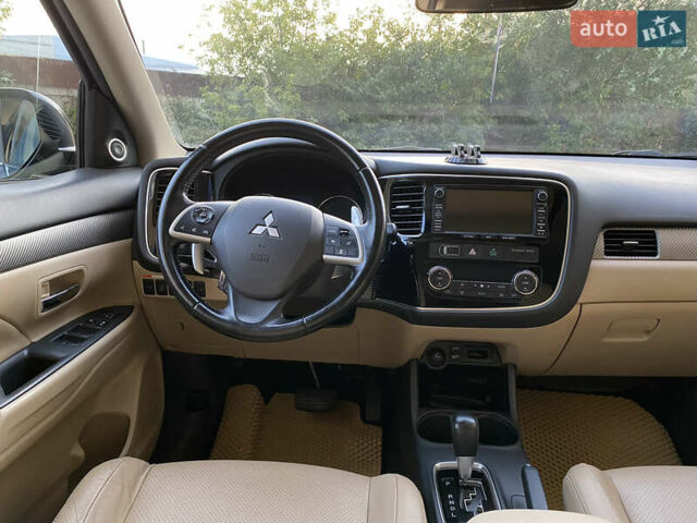 Черный Мицубиси Аутлендер, объемом двигателя 2.27 л и пробегом 241 тыс. км за 14400 $, фото 53 на Automoto.ua