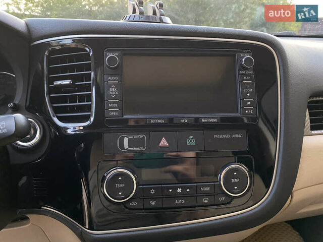 Черный Мицубиси Аутлендер, объемом двигателя 2.27 л и пробегом 241 тыс. км за 14400 $, фото 67 на Automoto.ua