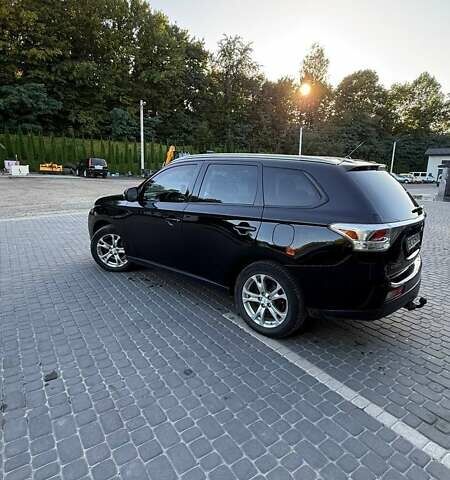 Мицубиси Аутлендер 2013 в Львове на Automoto.ua Черный Мицубиси Аутлендер, объемом двигателя 2.4 л и пробегом 236 тыс. км за 13000 $, фото 4 на Automoto.ua
