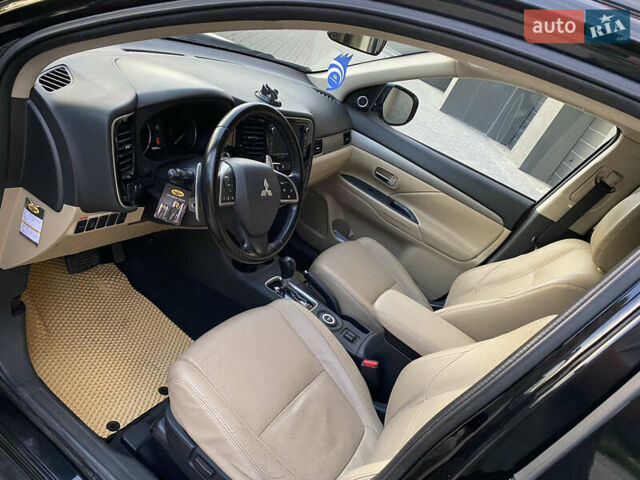 Черный Мицубиси Аутлендер, объемом двигателя 2.27 л и пробегом 241 тыс. км за 14400 $, фото 54 на Automoto.ua