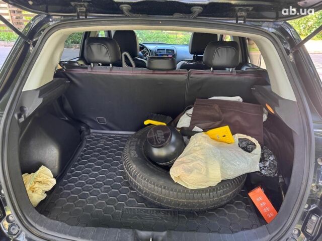 Черный Мицубиси Аутлендер, объемом двигателя 2 л и пробегом 195 тыс. км за 9990 $, фото 17 на Automoto.ua