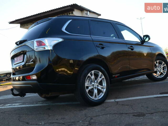 Чорний Міцубісі Аутлендер, об'ємом двигуна 2.2 л та пробігом 237 тис. км за 12550 $, фото 32 на Automoto.ua