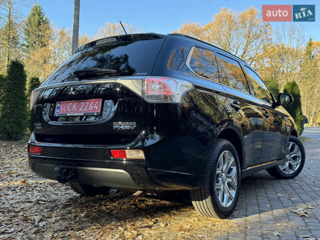 Чорний Міцубісі Аутлендер, об'ємом двигуна 2 л та пробігом 173 тис. км за 15299 $, фото 53 на Automoto.ua