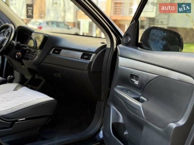 Черный Мицубиси Аутлендер, объемом двигателя 2.4 л и пробегом 270 тыс. км за 12500 $, фото 21 на Automoto.ua