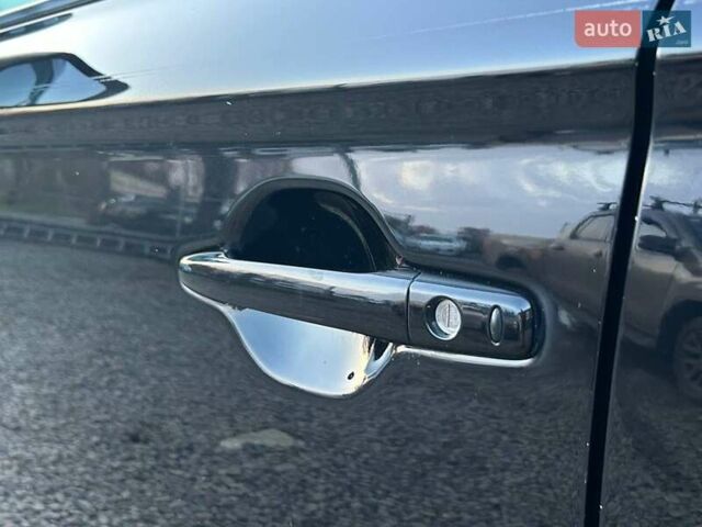 Чорний Міцубісі Аутлендер, об'ємом двигуна 2.4 л та пробігом 199 тис. км за 12800 $, фото 10 на Automoto.ua