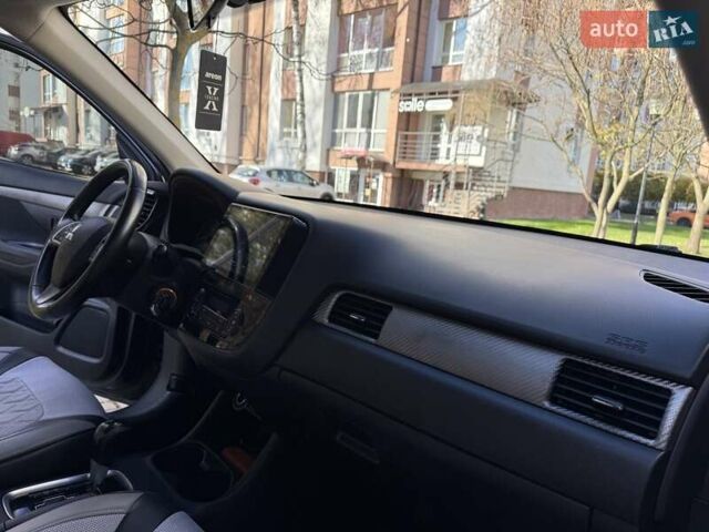 Черный Мицубиси Аутлендер, объемом двигателя 2.4 л и пробегом 270 тыс. км за 12500 $, фото 25 на Automoto.ua