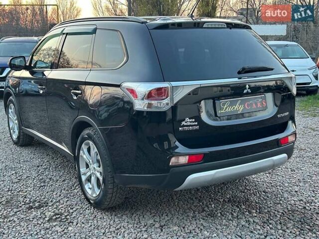 Чорний Міцубісі Аутлендер, об'ємом двигуна 2.4 л та пробігом 199 тис. км за 12800 $, фото 6 на Automoto.ua