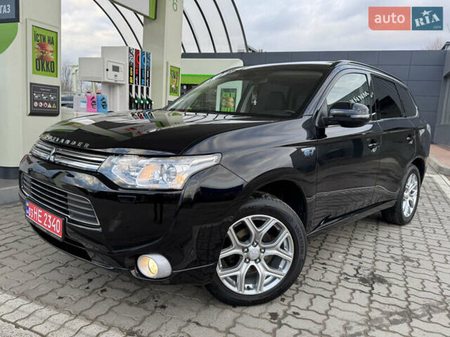 Чорний Міцубісі Аутлендер, об'ємом двигуна 2 л та пробігом 157 тис. км за 15299 $, фото 25 на Automoto.ua