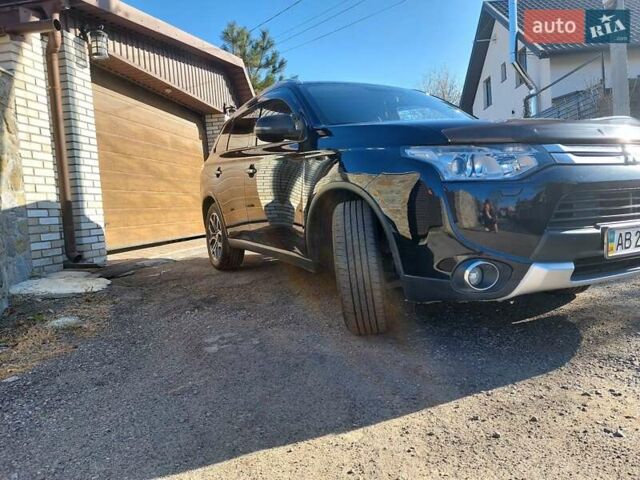 Черный Мицубиси Аутлендер, объемом двигателя 2.4 л и пробегом 183 тыс. км за 15000 $, фото 5 на Automoto.ua