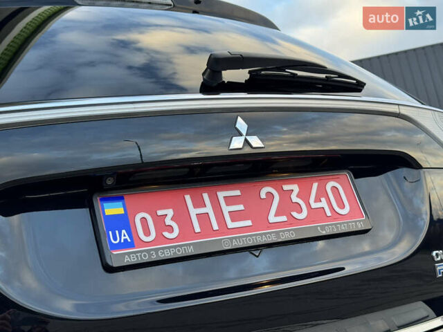 Чорний Міцубісі Аутлендер, об'ємом двигуна 2 л та пробігом 157 тис. км за 15299 $, фото 60 на Automoto.ua