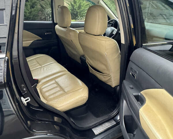 Черный Мицубиси Аутлендер, объемом двигателя 2.27 л и пробегом 244 тыс. км за 14000 $, фото 24 на Automoto.ua