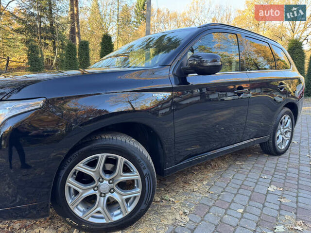 Чорний Міцубісі Аутлендер, об'ємом двигуна 2 л та пробігом 173 тис. км за 15299 $, фото 36 на Automoto.ua