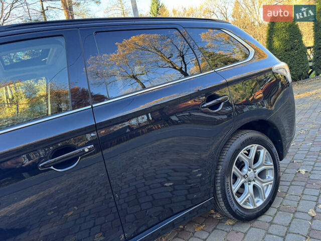 Чорний Міцубісі Аутлендер, об'ємом двигуна 2 л та пробігом 173 тис. км за 15299 $, фото 41 на Automoto.ua