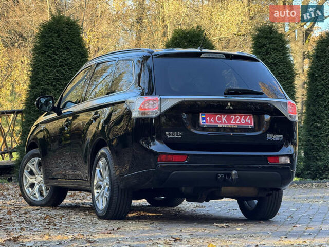 Чорний Міцубісі Аутлендер, об'ємом двигуна 2 л та пробігом 173 тис. км за 15299 $, фото 60 на Automoto.ua