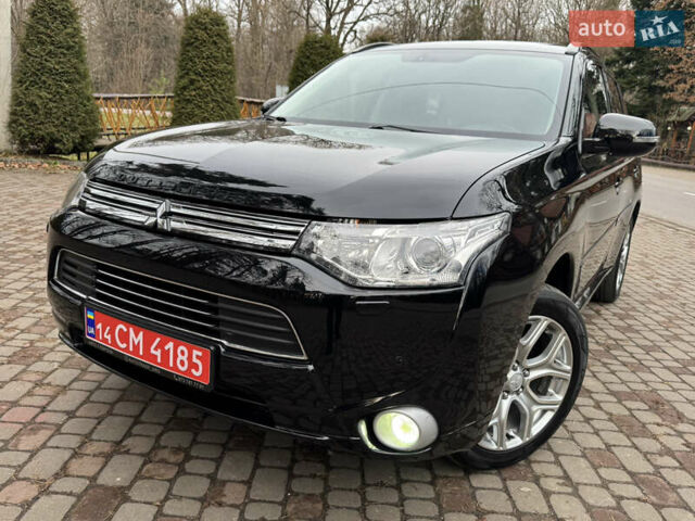 Черный Мицубиси Аутлендер, объемом двигателя 2 л и пробегом 173 тыс. км за 15299 $, фото 22 на Automoto.ua