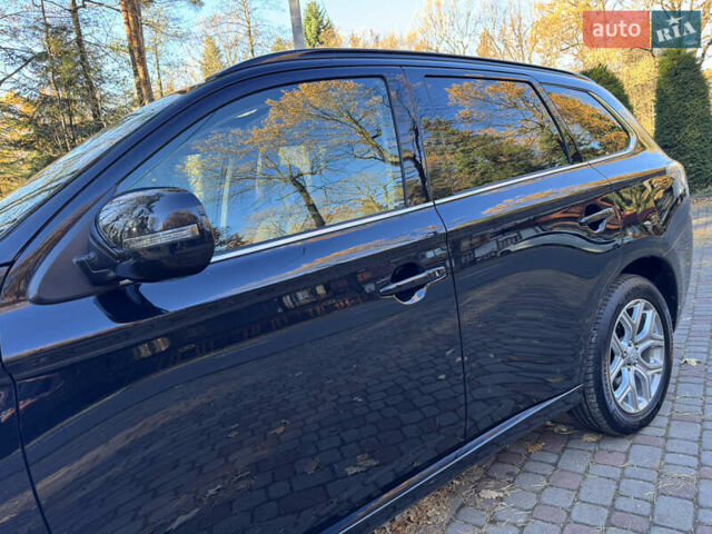Чорний Міцубісі Аутлендер, об'ємом двигуна 2 л та пробігом 173 тис. км за 15299 $, фото 40 на Automoto.ua