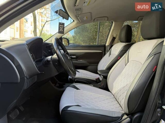 Черный Мицубиси Аутлендер, объемом двигателя 2.4 л и пробегом 270 тыс. км за 12500 $, фото 18 на Automoto.ua