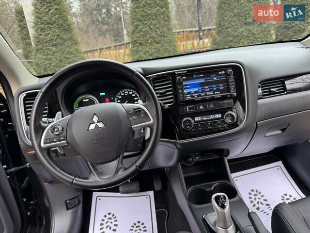 Черный Мицубиси Аутлендер, объемом двигателя 2 л и пробегом 173 тыс. км за 15299 $, фото 93 на Automoto.ua