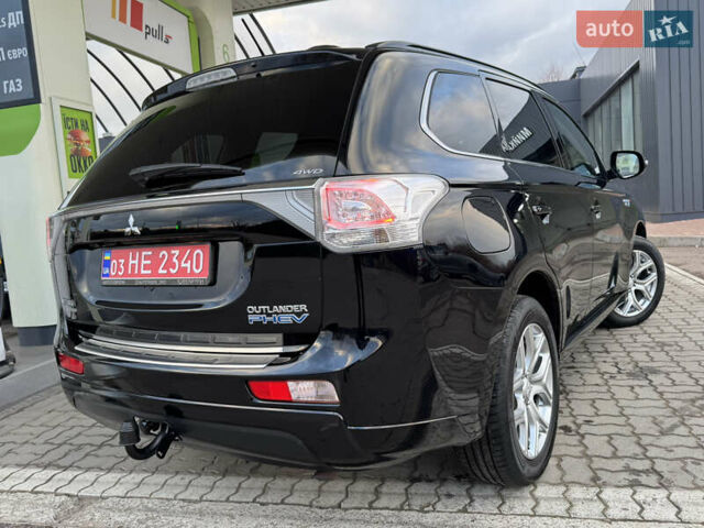 Чорний Міцубісі Аутлендер, об'ємом двигуна 2 л та пробігом 157 тис. км за 15299 $, фото 42 на Automoto.ua
