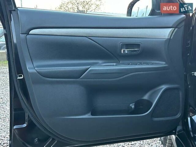 Чорний Міцубісі Аутлендер, об'ємом двигуна 2.4 л та пробігом 199 тис. км за 12800 $, фото 11 на Automoto.ua