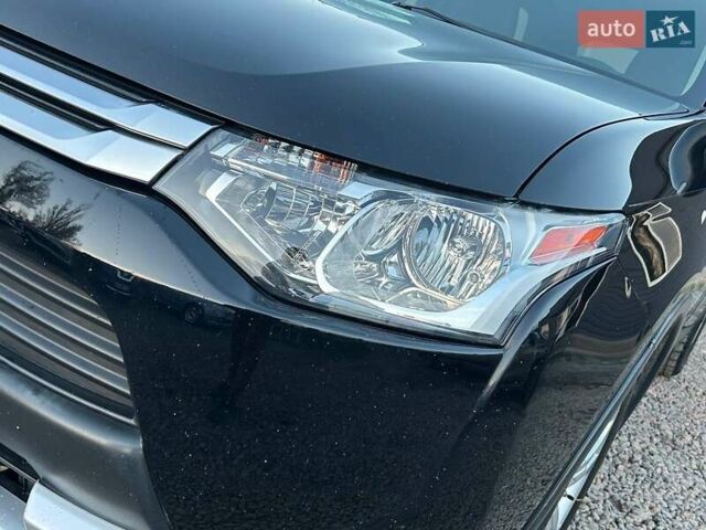 Чорний Міцубісі Аутлендер, об'ємом двигуна 2.4 л та пробігом 199 тис. км за 12800 $, фото 8 на Automoto.ua