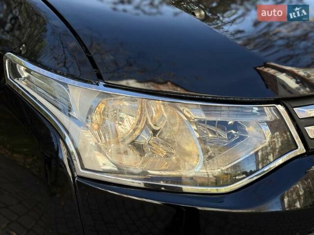 Черный Мицубиси Аутлендер, объемом двигателя 2.4 л и пробегом 270 тыс. км за 12500 $, фото 40 на Automoto.ua