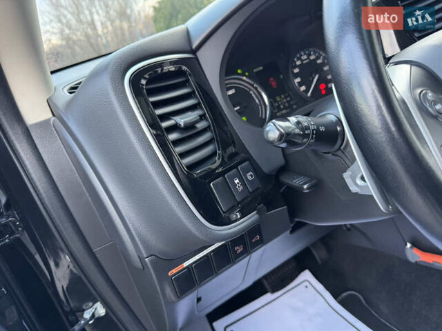 Чорний Міцубісі Аутлендер, об'ємом двигуна 2 л та пробігом 157 тис. км за 15299 $, фото 73 на Automoto.ua