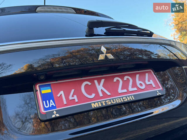 Чорний Міцубісі Аутлендер, об'ємом двигуна 2 л та пробігом 173 тис. км за 15299 $, фото 68 на Automoto.ua