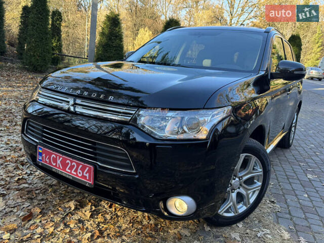 Чорний Міцубісі Аутлендер, об'ємом двигуна 2 л та пробігом 173 тис. км за 15299 $, фото 29 на Automoto.ua