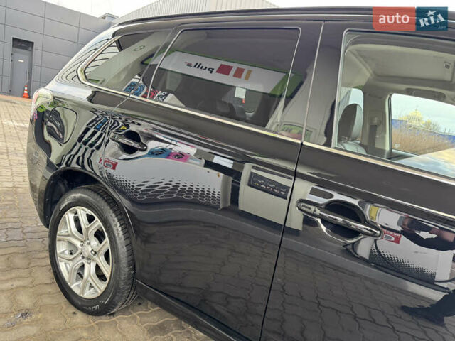 Чорний Міцубісі Аутлендер, об'ємом двигуна 2 л та пробігом 157 тис. км за 15299 $, фото 17 на Automoto.ua