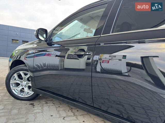 Чорний Міцубісі Аутлендер, об'ємом двигуна 2 л та пробігом 157 тис. км за 15299 $, фото 65 на Automoto.ua