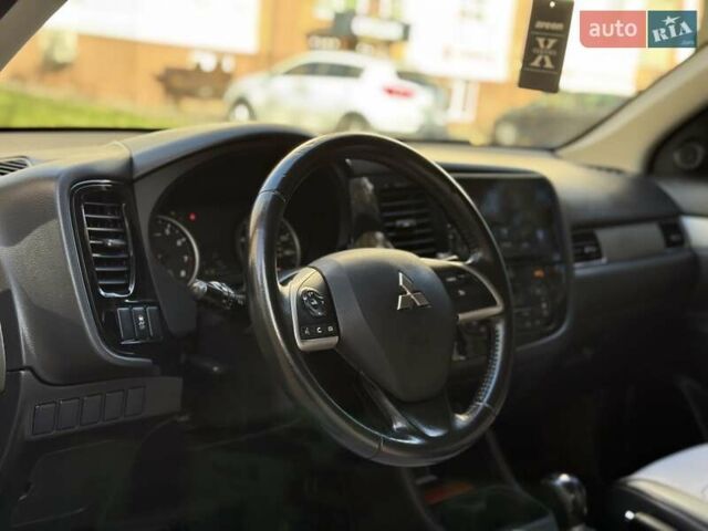 Черный Мицубиси Аутлендер, объемом двигателя 2.4 л и пробегом 270 тыс. км за 12500 $, фото 20 на Automoto.ua