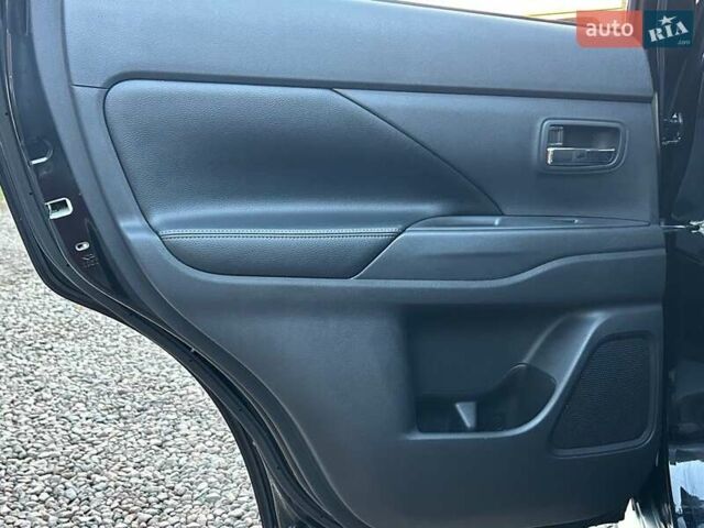 Чорний Міцубісі Аутлендер, об'ємом двигуна 2.4 л та пробігом 199 тис. км за 12800 $, фото 25 на Automoto.ua