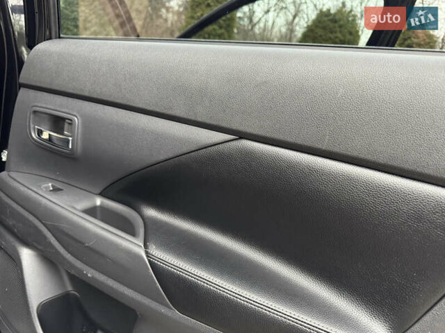 Черный Мицубиси Аутлендер, объемом двигателя 2 л и пробегом 173 тыс. км за 15299 $, фото 102 на Automoto.ua